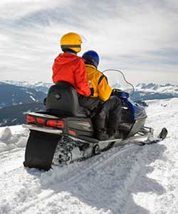 two people on snowmobile