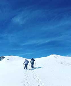 snowshoeing up a ridge